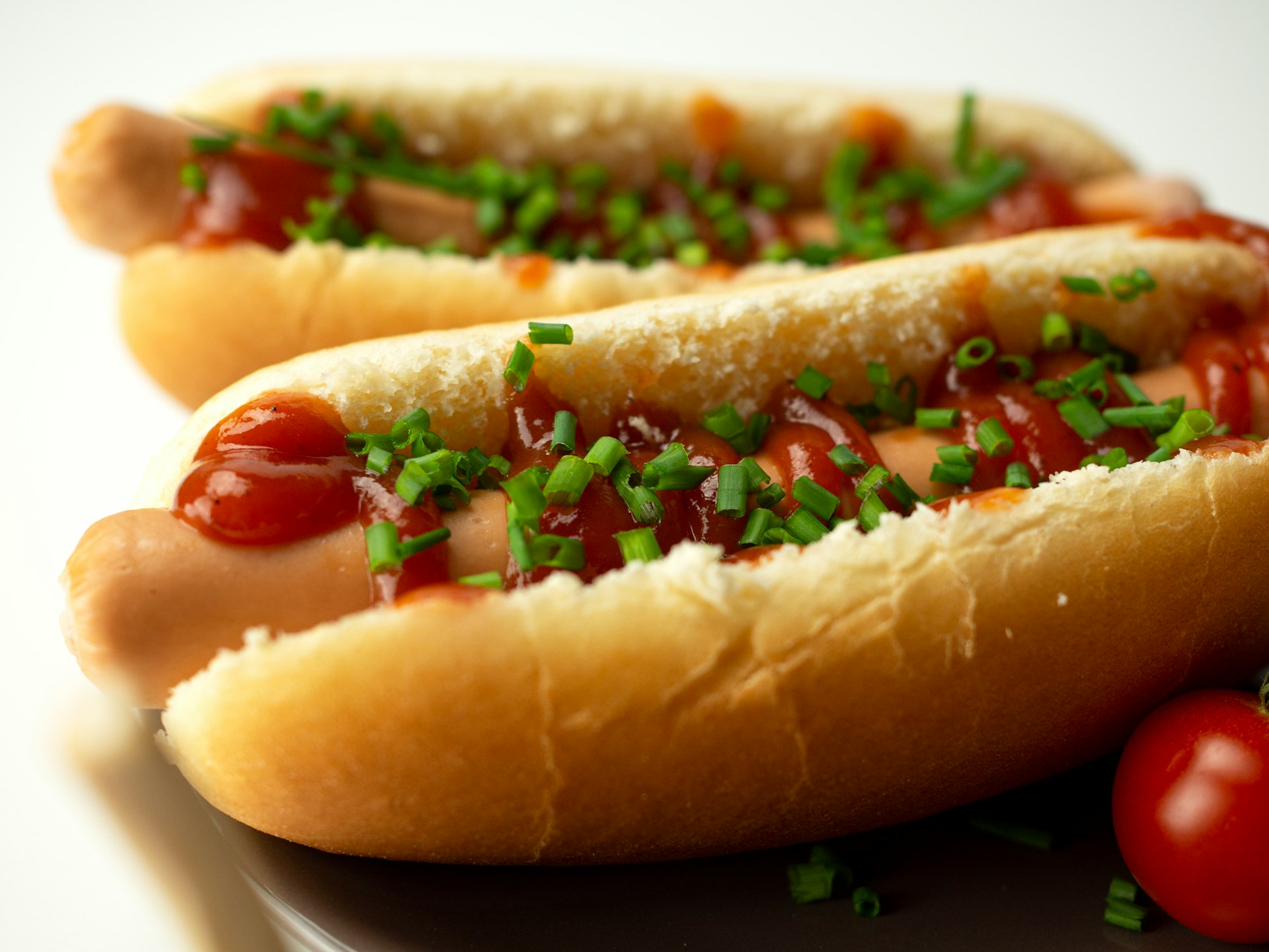 hotdog sandwich on white ceramic plate